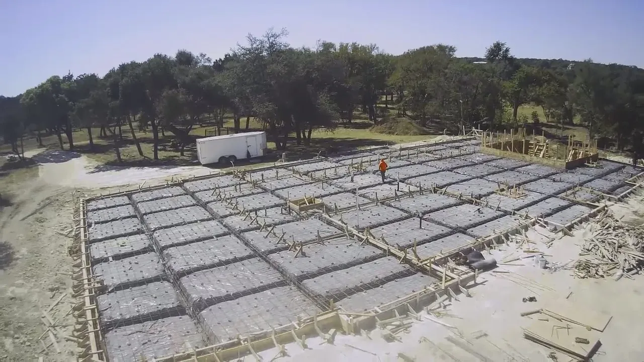 Shamrock Concrete crew pouring and finishing a residential foundation in Central Texas